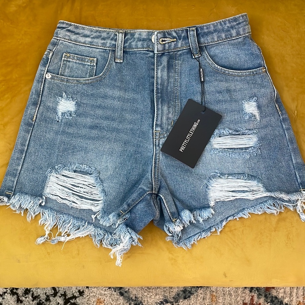 Pretty Little Thing distressed light denim wash shorts